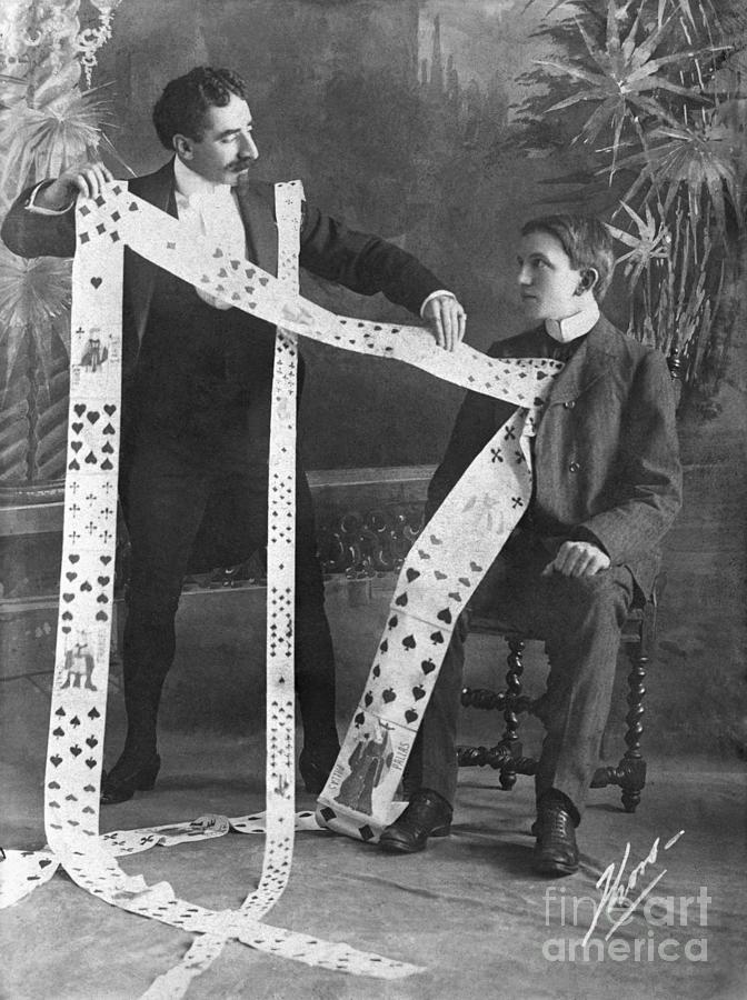 Magician Pulling Cards From Jacket Photograph by Bettmann