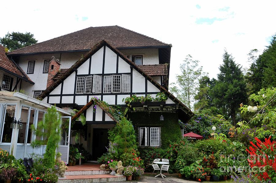 Main entrance to colonial era Tudor style bungalow cottage now a hotel Cameron Highlands Malaysia Photograph by Imran Ahmed