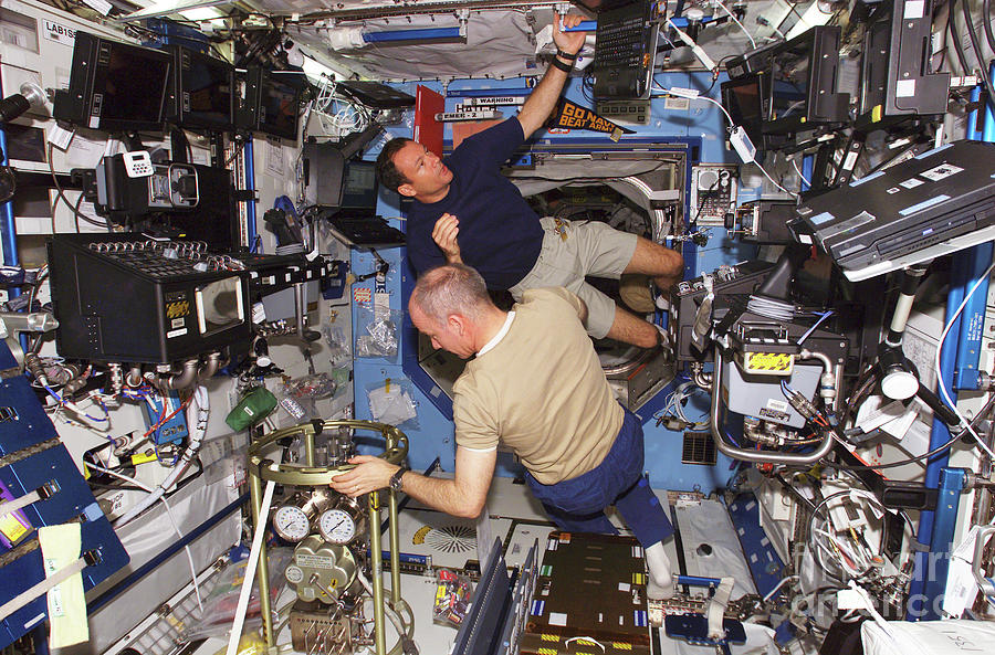 Maintenance On The Iss Photograph by Nasa/science Photo Library