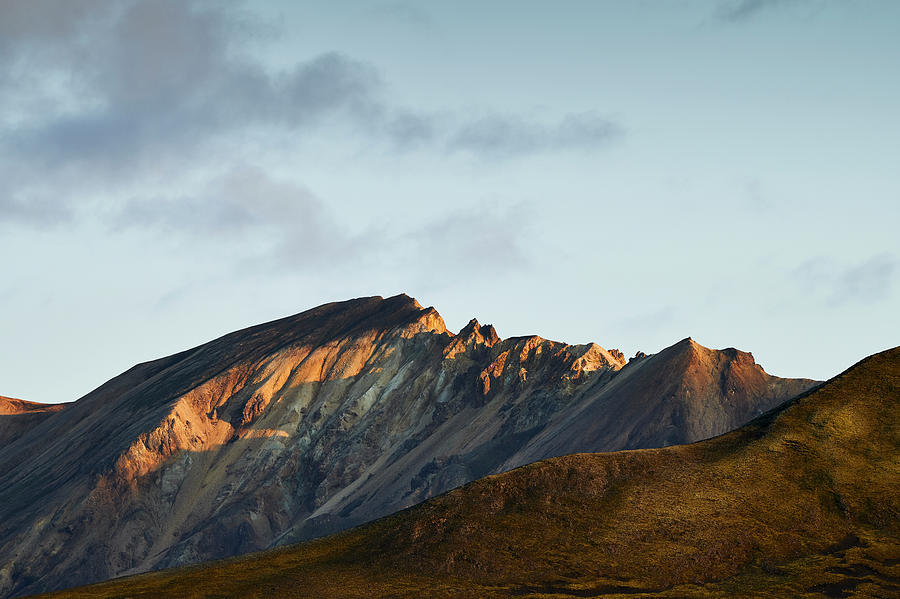 Majestic Mountain Ridge Against Cloudy Sky Photograph by Cavan Images ...