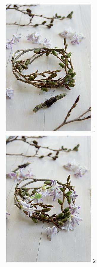 Making A Wreath Of Alder Catkins And Hyacinth Florets Photograph by Martina Schindler