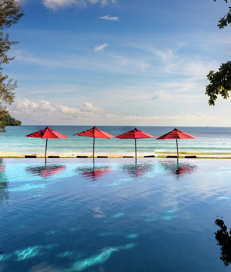 Malaysia, Sabah, Kota Kinabalu, Gaya Island (pulau Gaya), Bungaraya Island Resort. Infinity Pool And Reflection Of Beach Umbrellas Digital Art by Paolo Giocoso