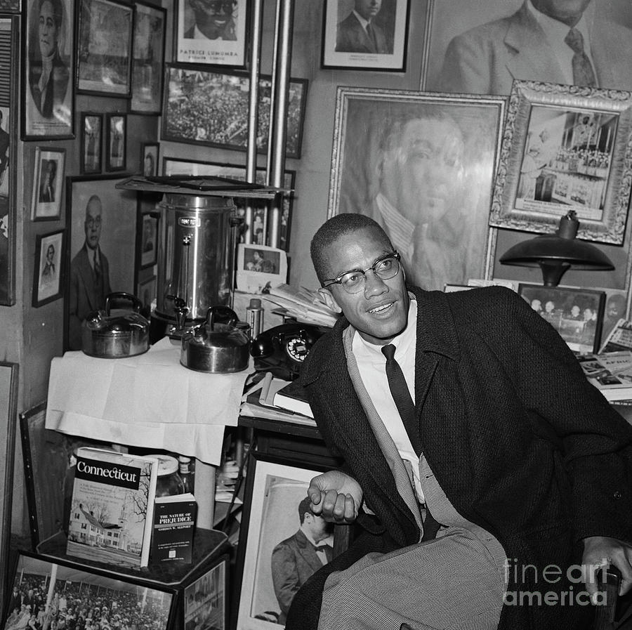Malcolm X Sitting In Decorated Office Photograph by Bettmann