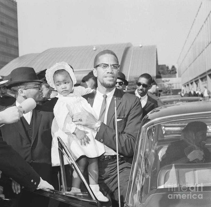 Malcolm X With Daughter Ilyasah Photograph by Bettmann