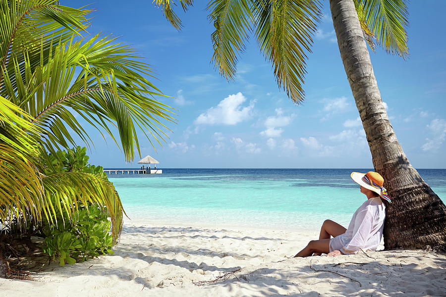Maldives, Woman Resting Under Palm Digital Art by Jan Wlodarczyk