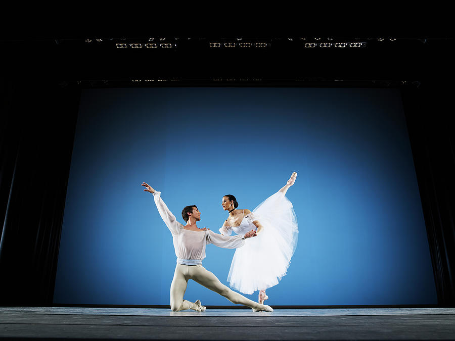 Male And Female Ballet Dancers Photograph by Thomas Barwick
