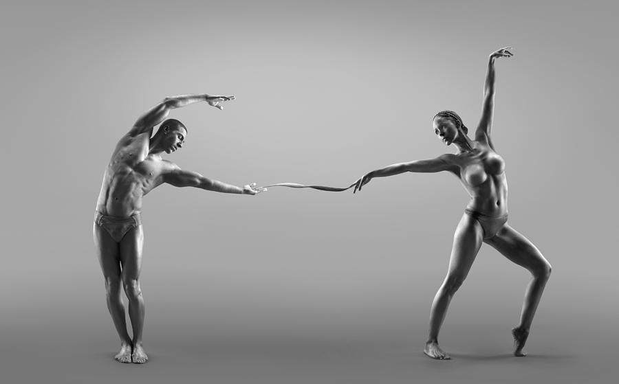 Male And Female Dancer Connected Through Photograph by Jonathan Knowles