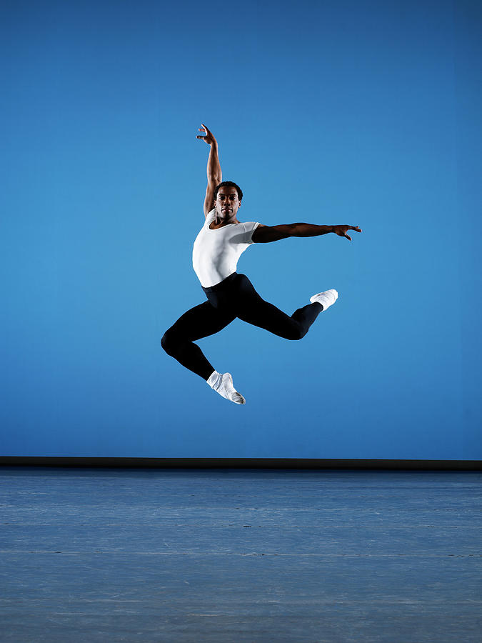 Male Ballet Dancer Leaping On Stage Photograph by Thomas Barwick
