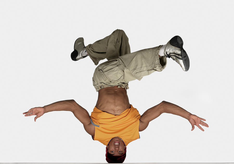 Male Breakdancer Balancing On Head Photograph by John Lamb