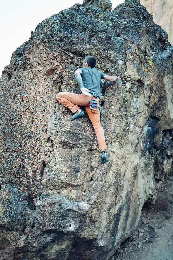 Sports Photograph - Male Climber Getting Ready For A Push To The Boulder Top In Smith Rock by Cavan Images