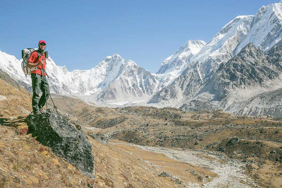 Male Climber Poses While Trekking High Above Everest Basecamp ...