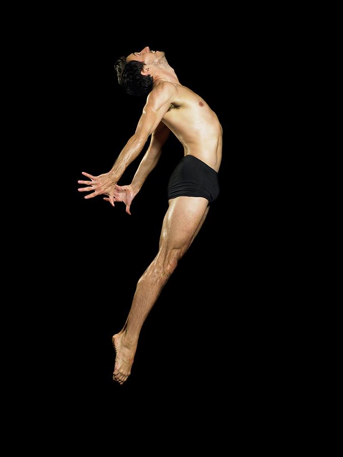 Male Dancer Jumping Photograph by Image Source