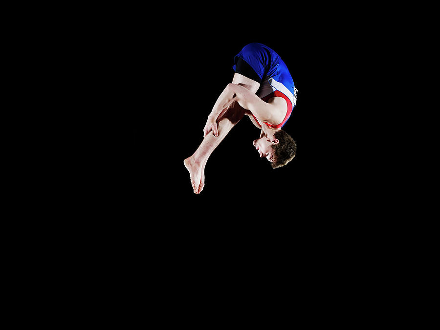 Male Gymnast 16-17 Mid Air, Black Photograph by Thomas Barwick