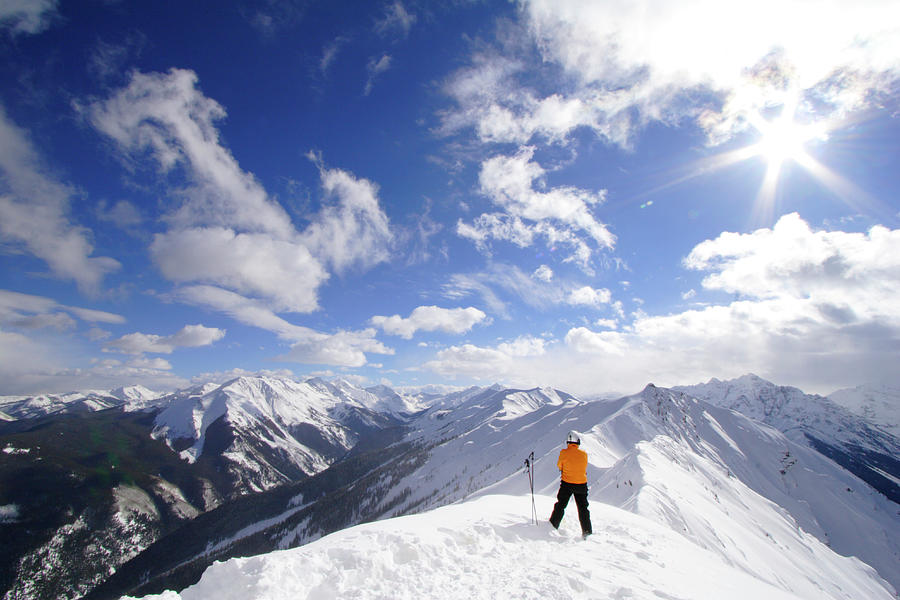Male Skier Looking At Snow Covered Photograph by Tyler Stableford
