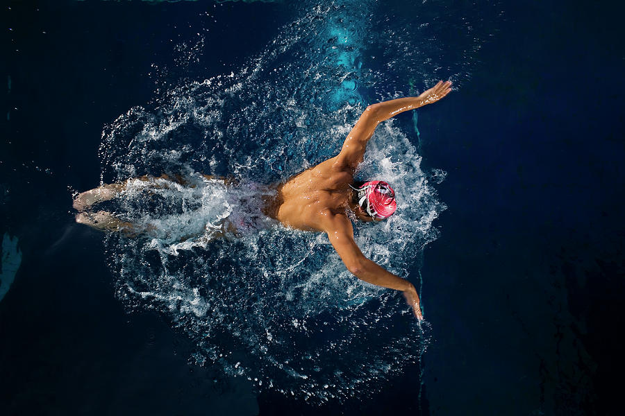 Male Swimmer Performing Butterfly Photograph by Photo And Co