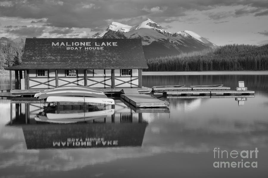 Maligne Lake Boathouse Summer Refelctions Black And White Photograph by Adam Jewell