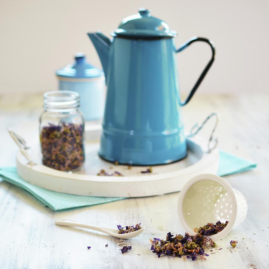 Mallow Tea In A Teapot With A Glass Jar And Tea Sieve Photograph by Mariola Streim