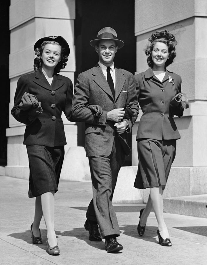 Man & Two Woman Strolling On Urban Photograph by George Marks