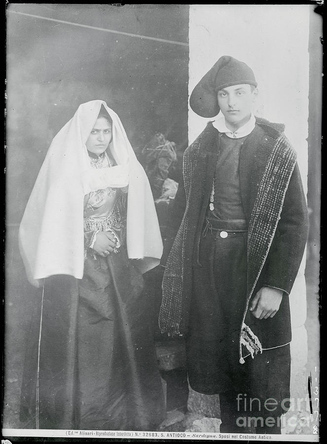 Man And Woman Posing In Exquisite Dress Photograph by Bettmann