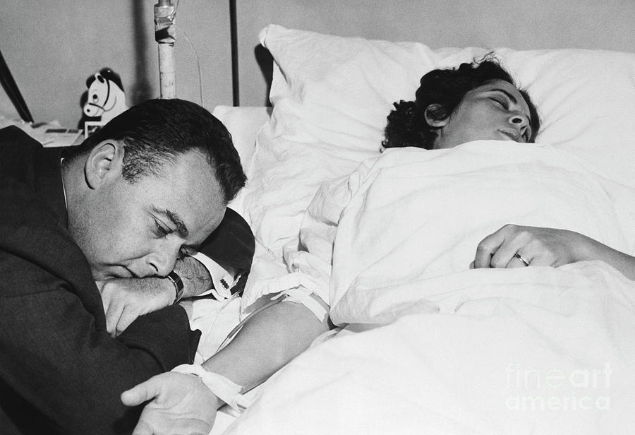 Man At Hospitalized Wifes Bedside Photograph by Bettmann Man At Hospitalized Wifes Bedside Photograph by Bettmann