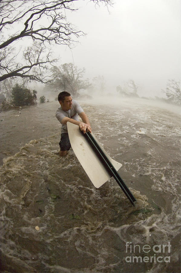 Sign Photograph - Man Battling Hurricane Katrina by Jim Reed Photography/science Photo Library
