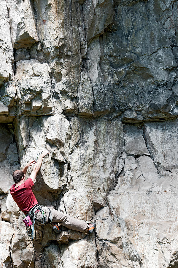Rope Photograph - Man Climbing Limestone Rock Face In Swanage / Uk by Cavan Images