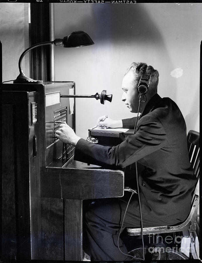 Man Connecting Call At Switchboard Photograph by Bettmann