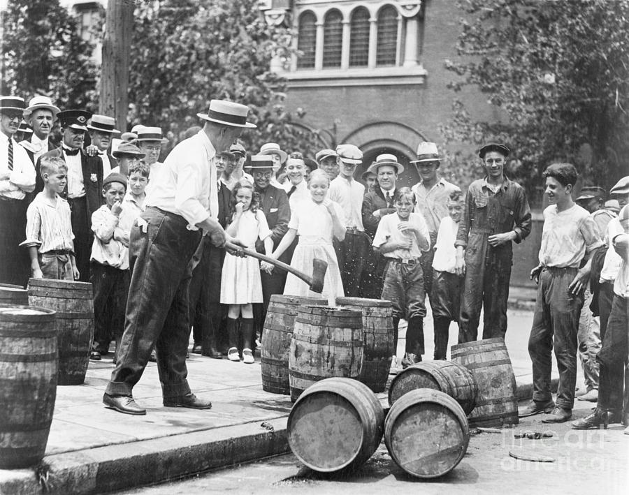 Man Destroying Barrels Of Beer Photograph by Bettmann