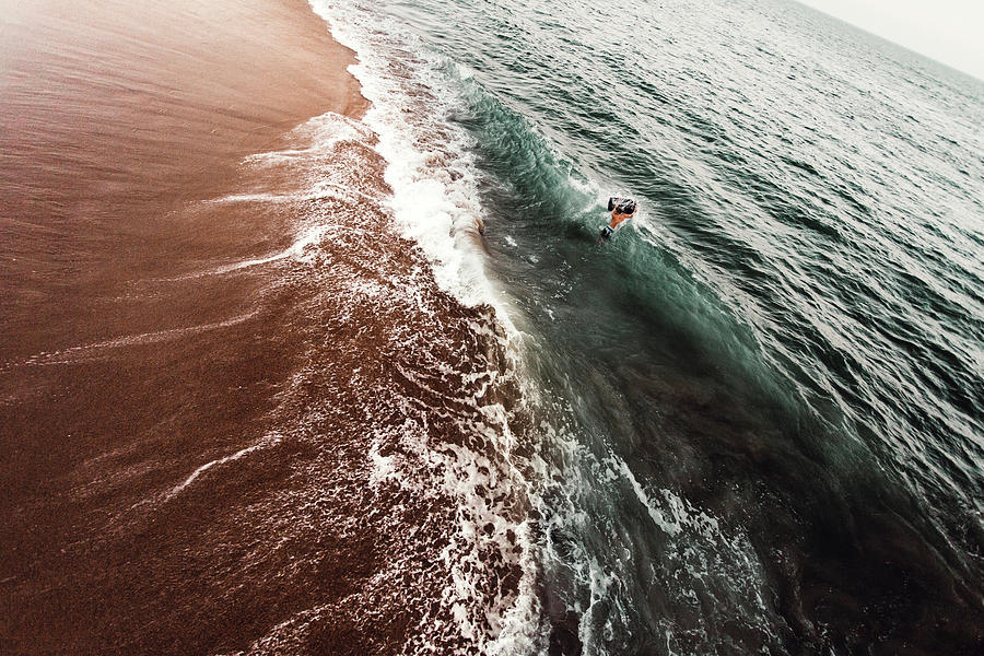 Man Drowning In Sea At Beach Photograph by Cavan Images - Pixels