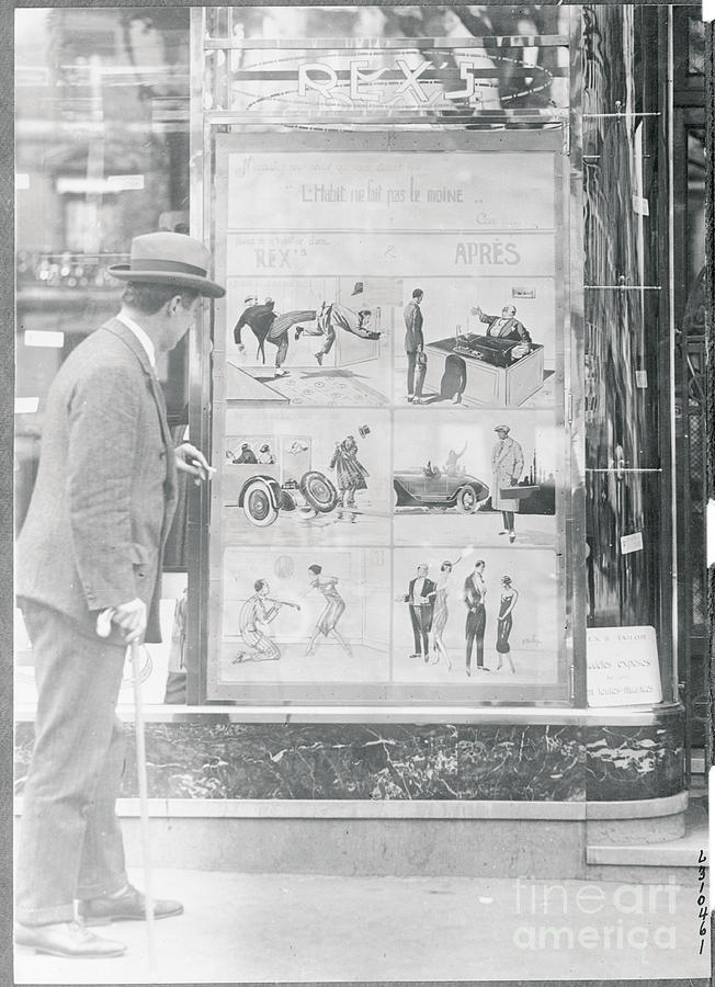 Man Gazing At Posted Advertisement Photograph by Bettmann