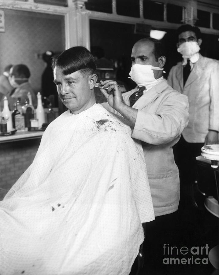 Man Getting Haircut From Barber Wearing Photograph by Bettmann