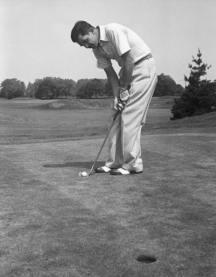 Man Golfing Photograph by George Marks Man Golfing Photograph by George Marks