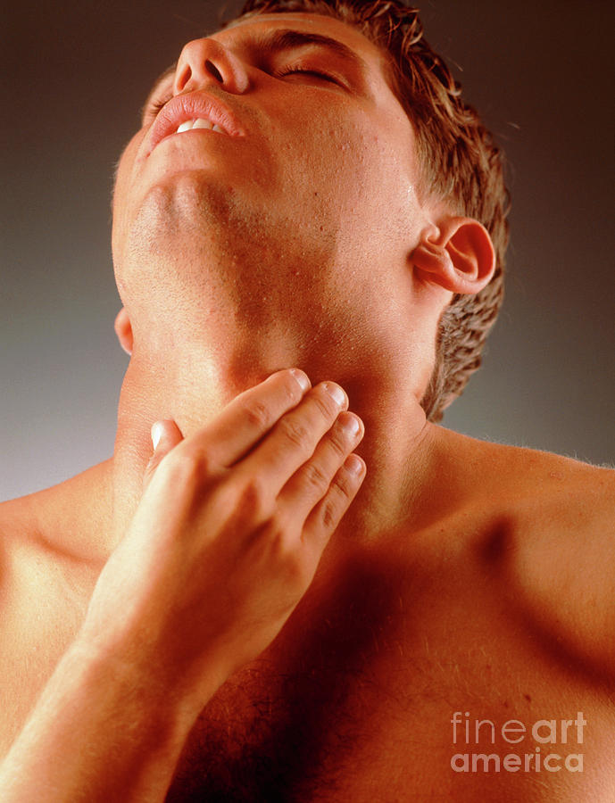 Man Holds His Neck Suffering Neck Or Throat Pain Photograph by Oscar Burriel/science Photo Library