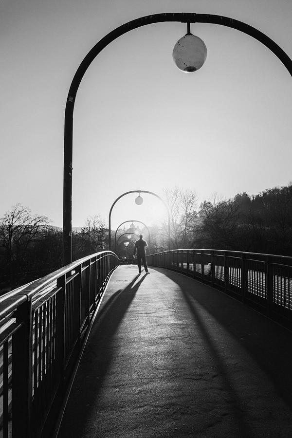 Man In Backlight On A Bridge Photograph by Eiji Yamamoto