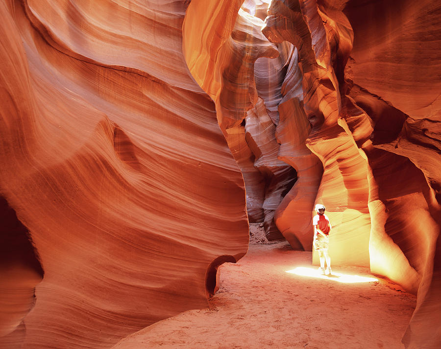 Man In Canyon In Sun Spot, Looking Up Photograph by Buena Vista Images