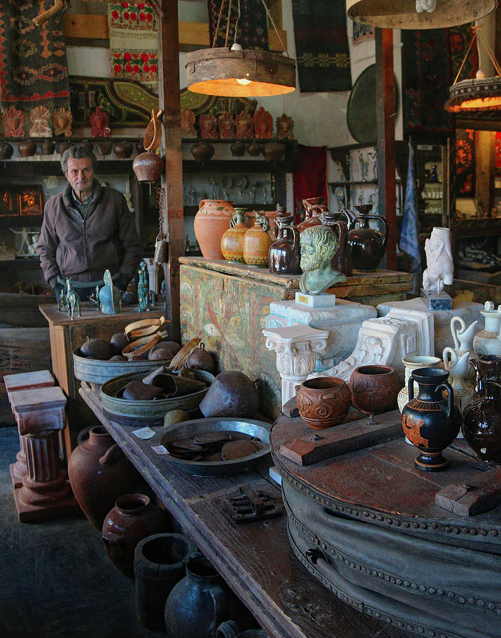 Man in Shop in Delphi Photograph by M Kathleen Warren