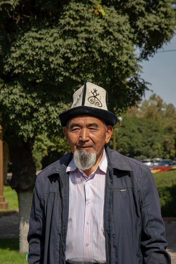 Man in traditional hat, Bishkek, Kyrgyzstan Photograph by Karen Foley