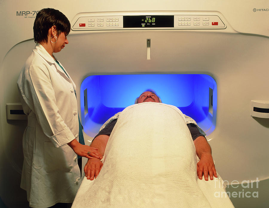 Man In Wide Mri Scanner For Claustrophobics Photograph by John Greim/science Photo Library