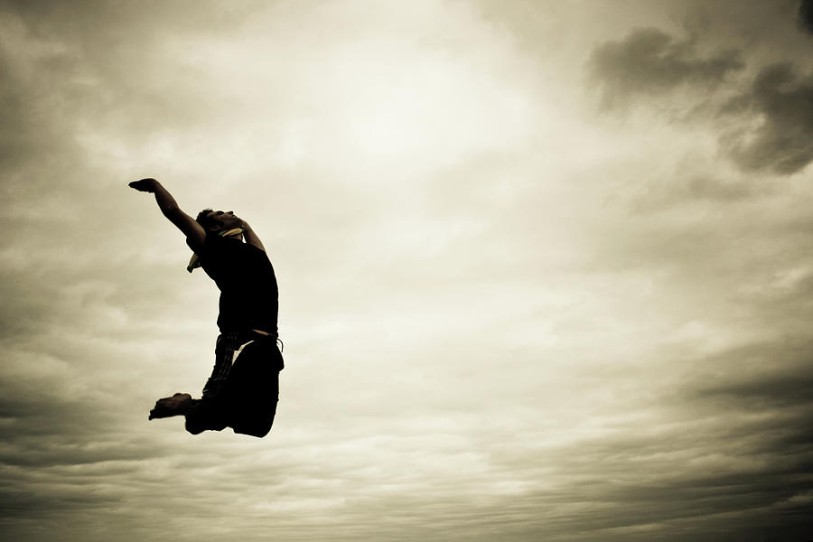 Man Jumping Free Photograph by Guillermo Casas Baruque