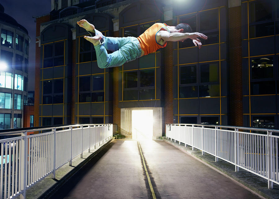 Man Jumping In City Photograph by Tara Moore
