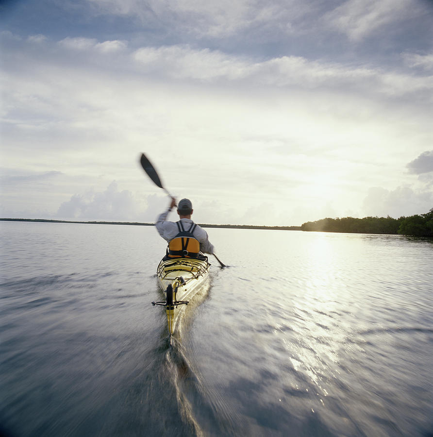 Man Kayaking, Rear View Photograph by Gary John Norman