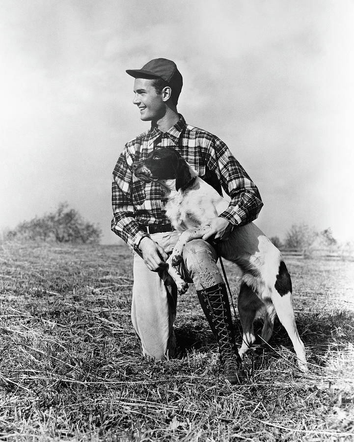 Man Kneeling Down Next To Setter, Arm Photograph by H. Armstrong Roberts