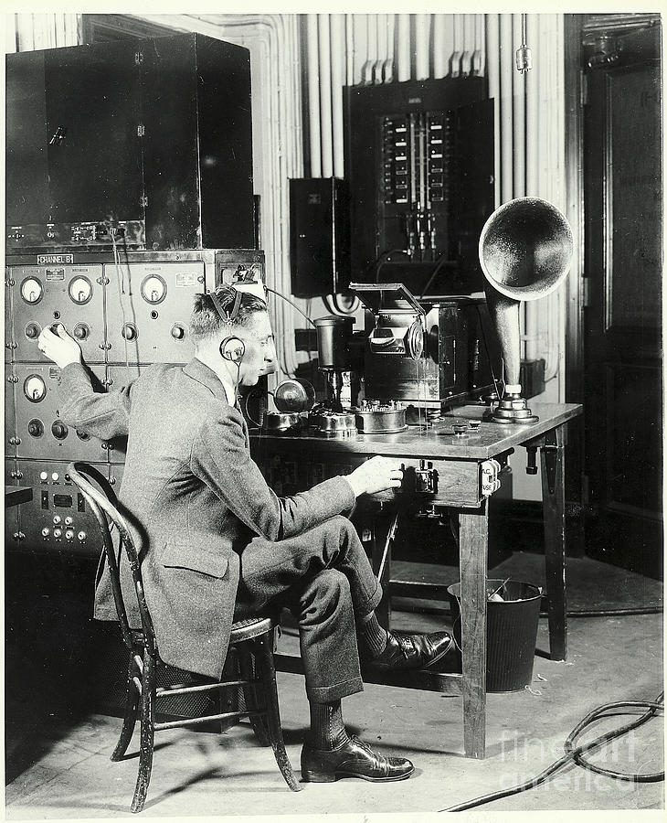 Man Monitors Radio Waves In Control Room Photograph by Bettmann