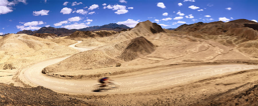 Man Mountain Biking In Desert Digital Art by Giovanni Simeone