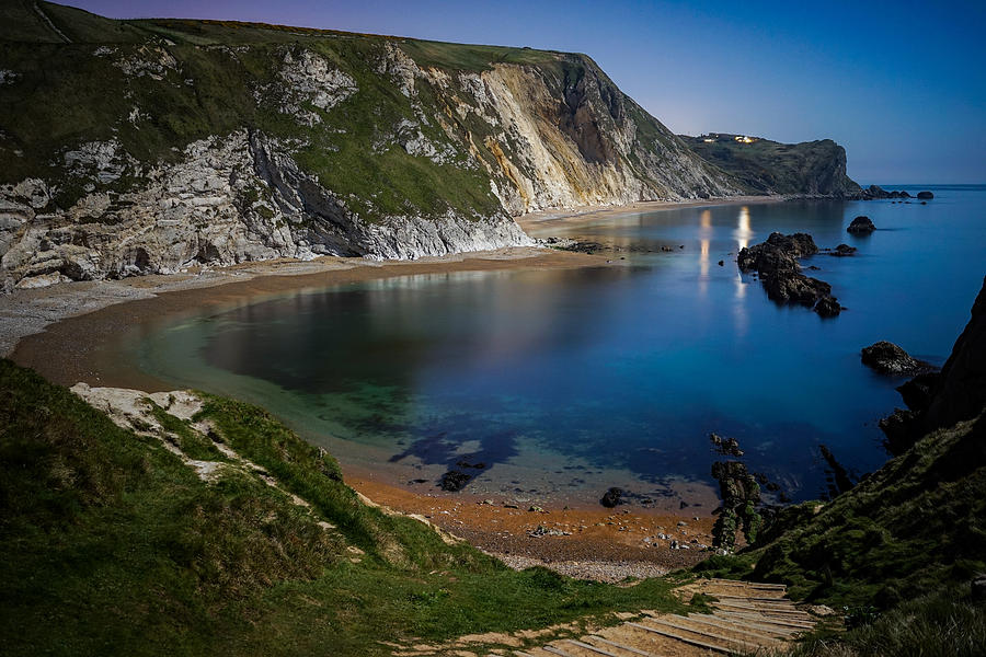 Man o war bay in England seen on a clear beautiful night. Photograph by George Afostovremea