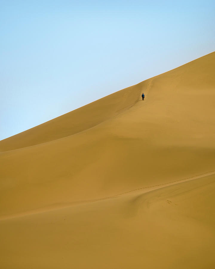 Man on Dunes Dunhuang Gansu China Photograph by Adam Rainoff