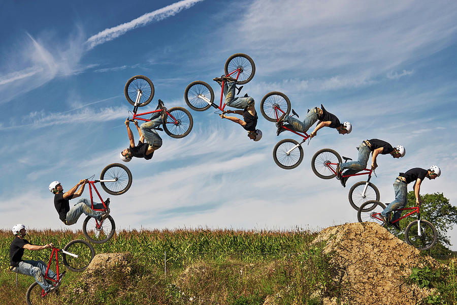 Man Performing Stunt On Bmx Bike Photograph by Manuel Sulzer