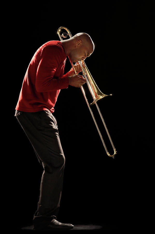 Man Playing Trombone, Side View Photograph by Moodboard