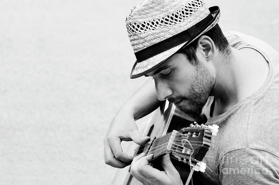 Man plays the guitar Photograph by Jelena Jovanovic