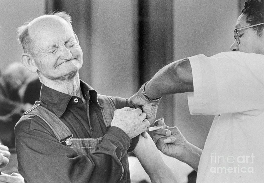 Man Receiving Flu Shot Photograph by Bettmann
